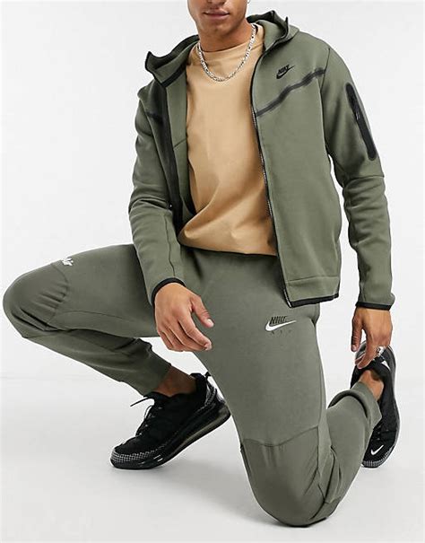 nike tracksuit fake|khaki nike tracksuit.